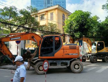 Two excavators are responsible for dismantling the offending works